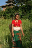 Bryan (DreamerImages) > A gardner, she uses the sickle to cut grass and rice.